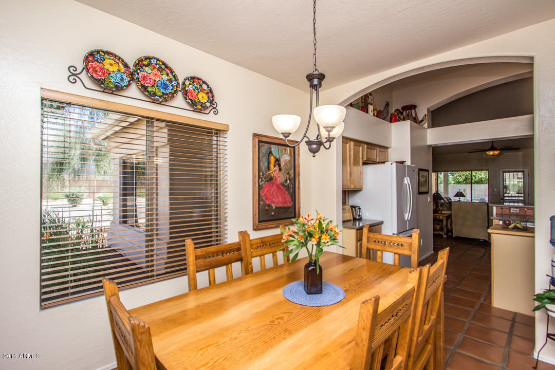 923 East Redfield Road Phoenix, AZ 85022 - Photo 14 of 42 a view of a dining room with furniture