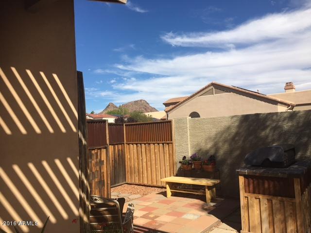 923 East Redfield Road Phoenix, AZ 85022 - Photo 33 of 42 a view of a terrace with chairs