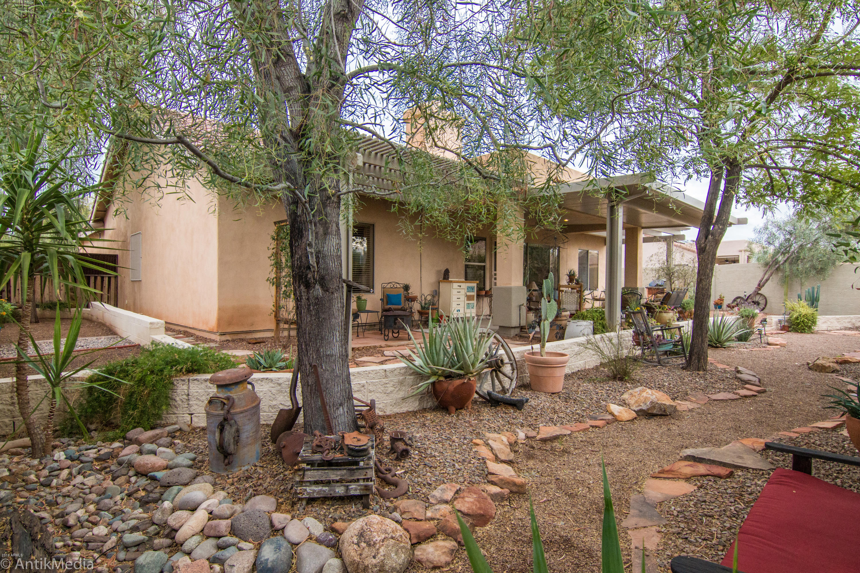923 East Redfield Road Phoenix, AZ 85022 - Photo 35 of 42 a view of a house with backyard porch and sitting area