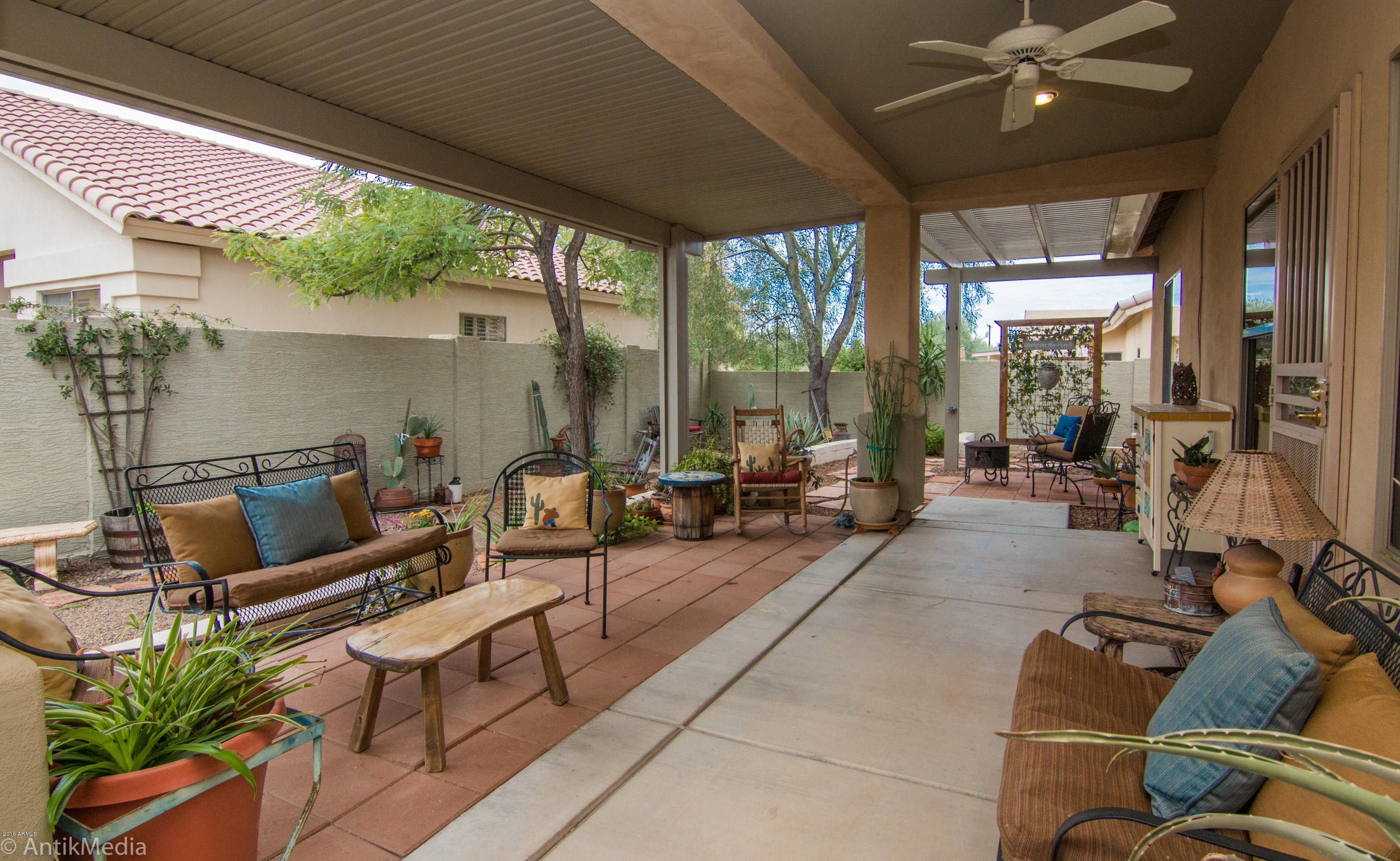 923 East Redfield Road Phoenix, AZ 85022 - Photo 41 of 42 a living room with furniture and a large window