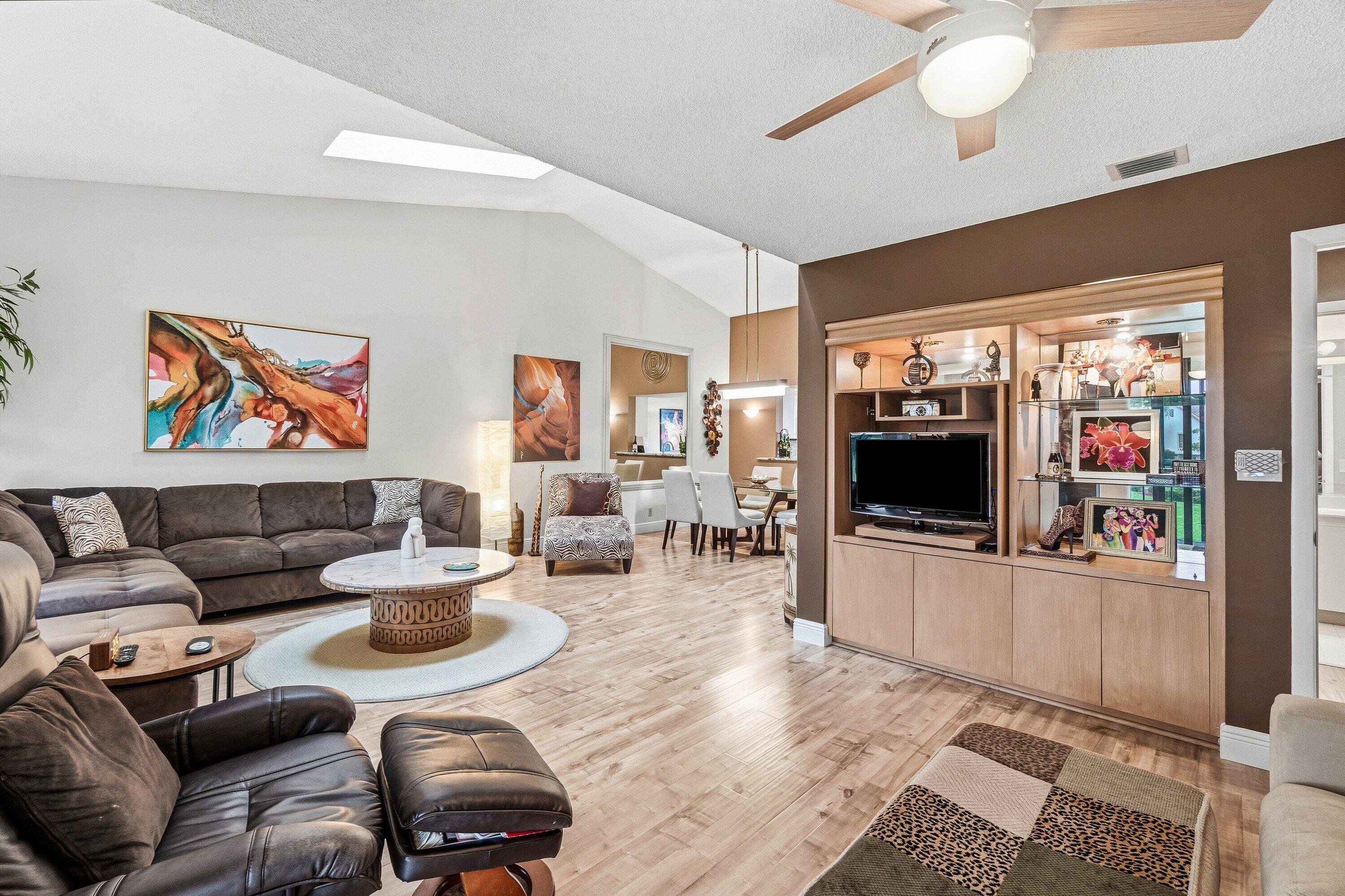 7759 La Mirada Drive Boca Raton, FL 33433 - Photo 18 of 37 a living room with furniture and a flat screen tv