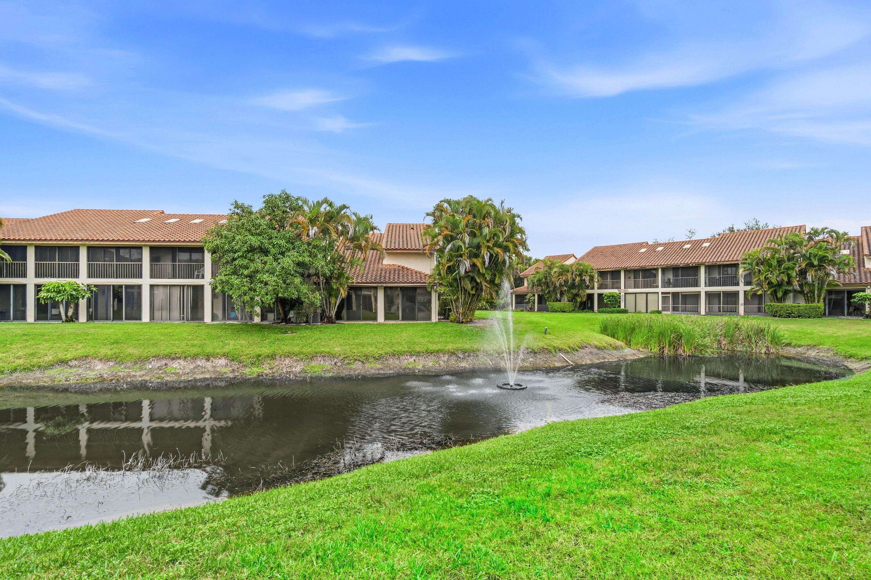 7759 La Mirada Drive Boca Raton, FL 33433 - Photo 31 of 37 a view of a house with a yard