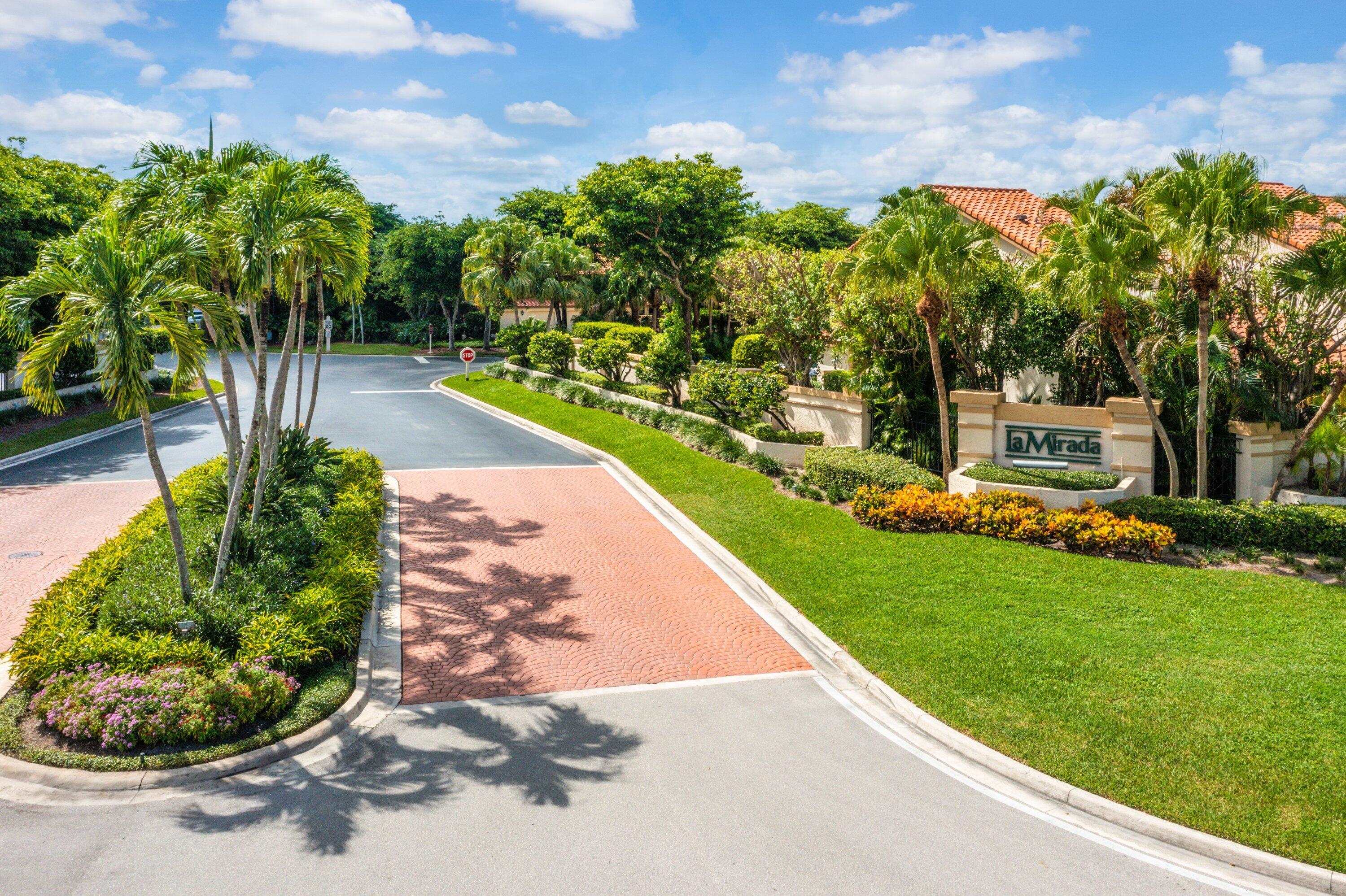 7759 La Mirada Drive Boca Raton, FL 33433 - Photo 37 of 37 a view of a garden with a bench