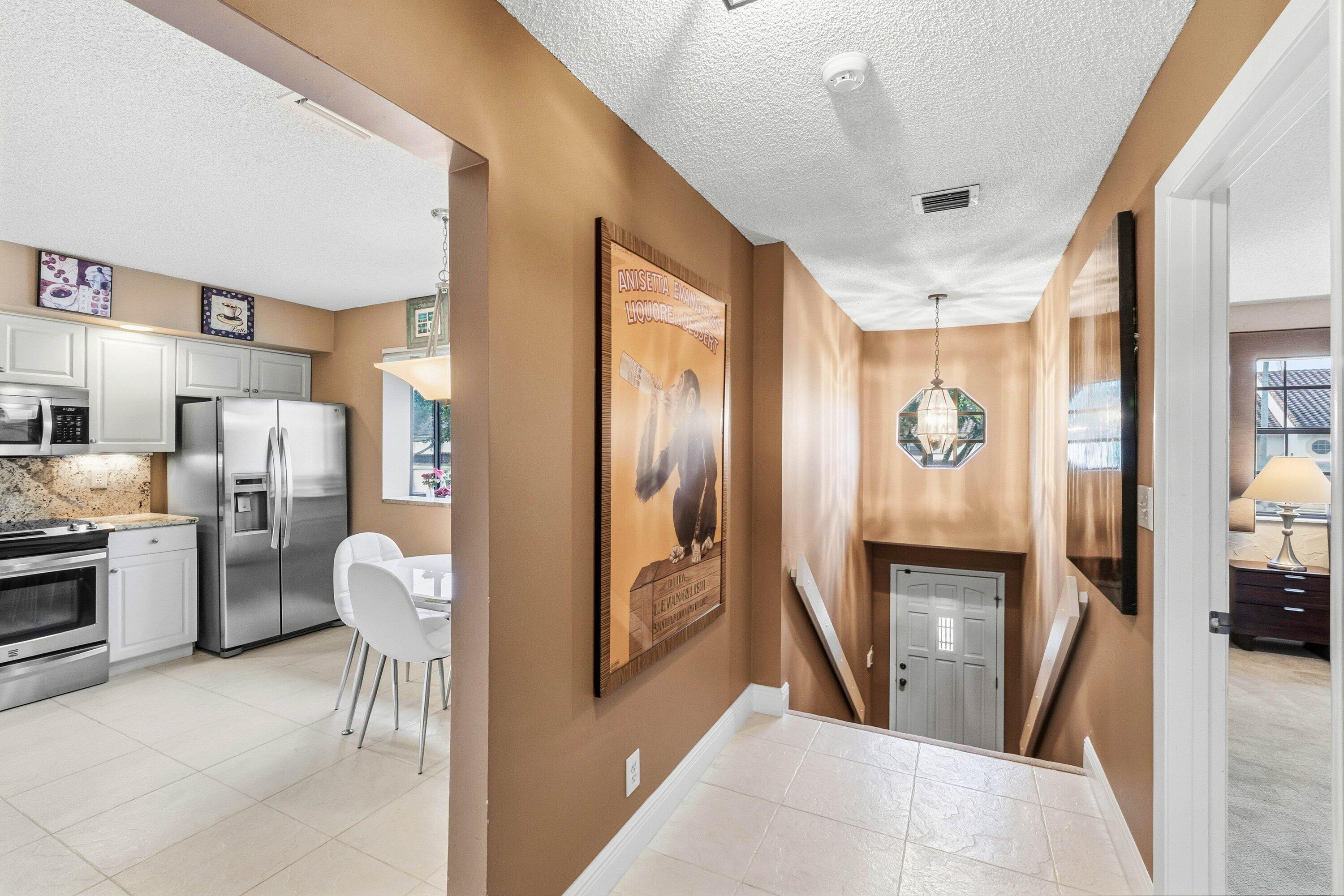 7759 La Mirada Drive Boca Raton, FL 33433 - Photo 5 of 37 a spacious bathroom with a toilet sink and mirror