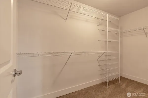 a view of a room with racks on the wall