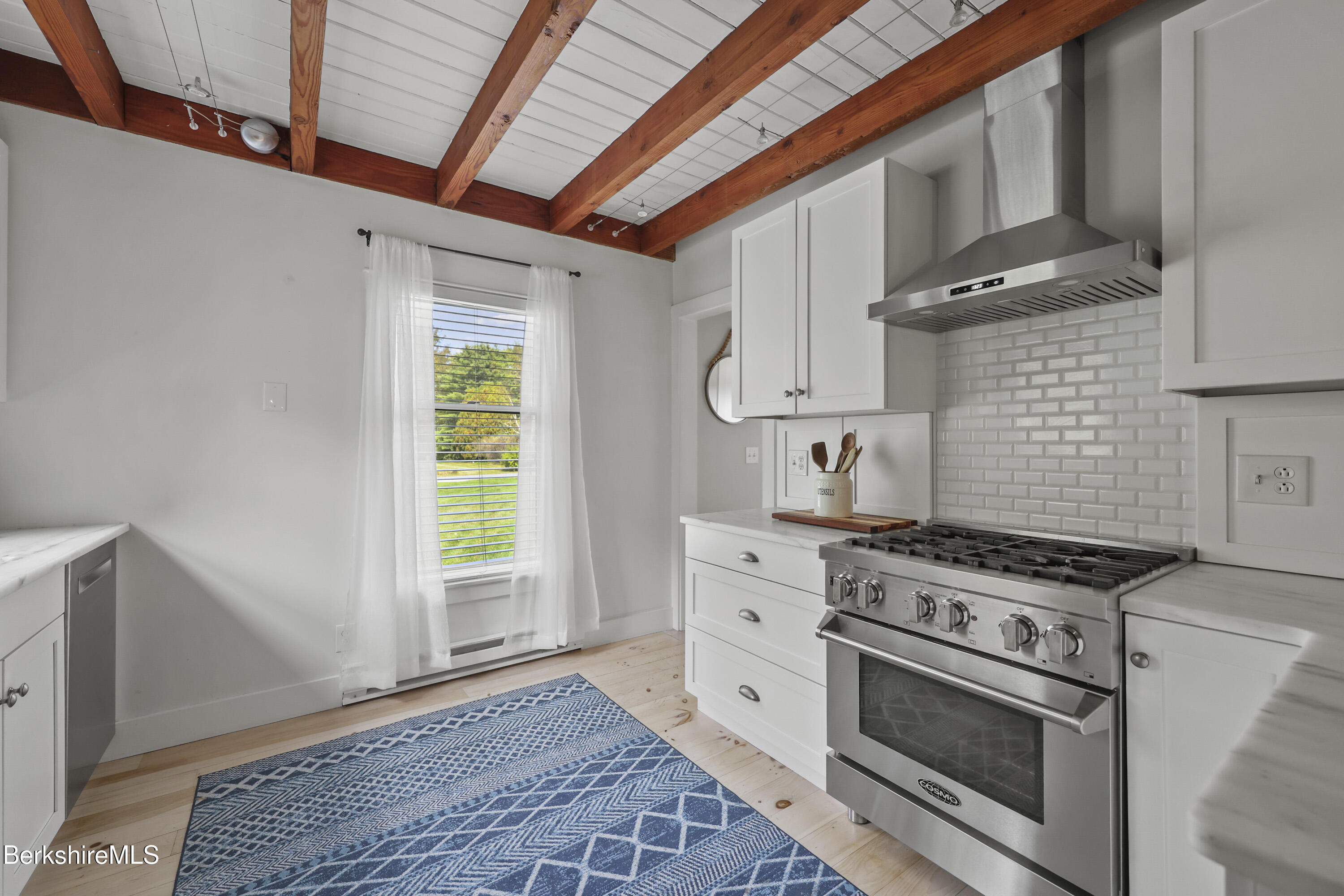 17 Iron Mine Road West Stockbridge, MA 01266 - Photo 18 of 49 a kitchen with stove and cabinets