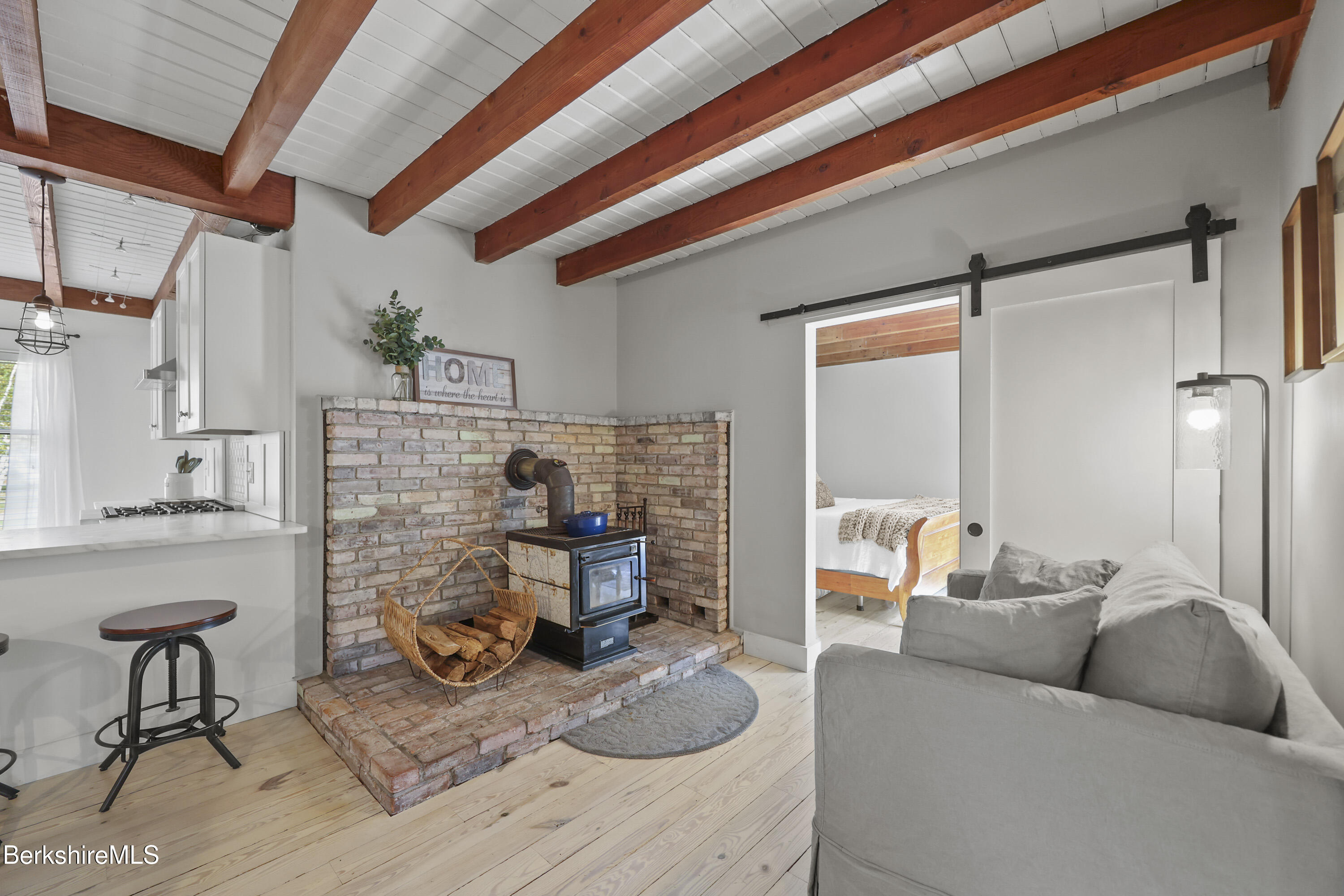 17 Iron Mine Road West Stockbridge, MA 01266 - Photo 24 of 49 a living room with furniture and a fireplace