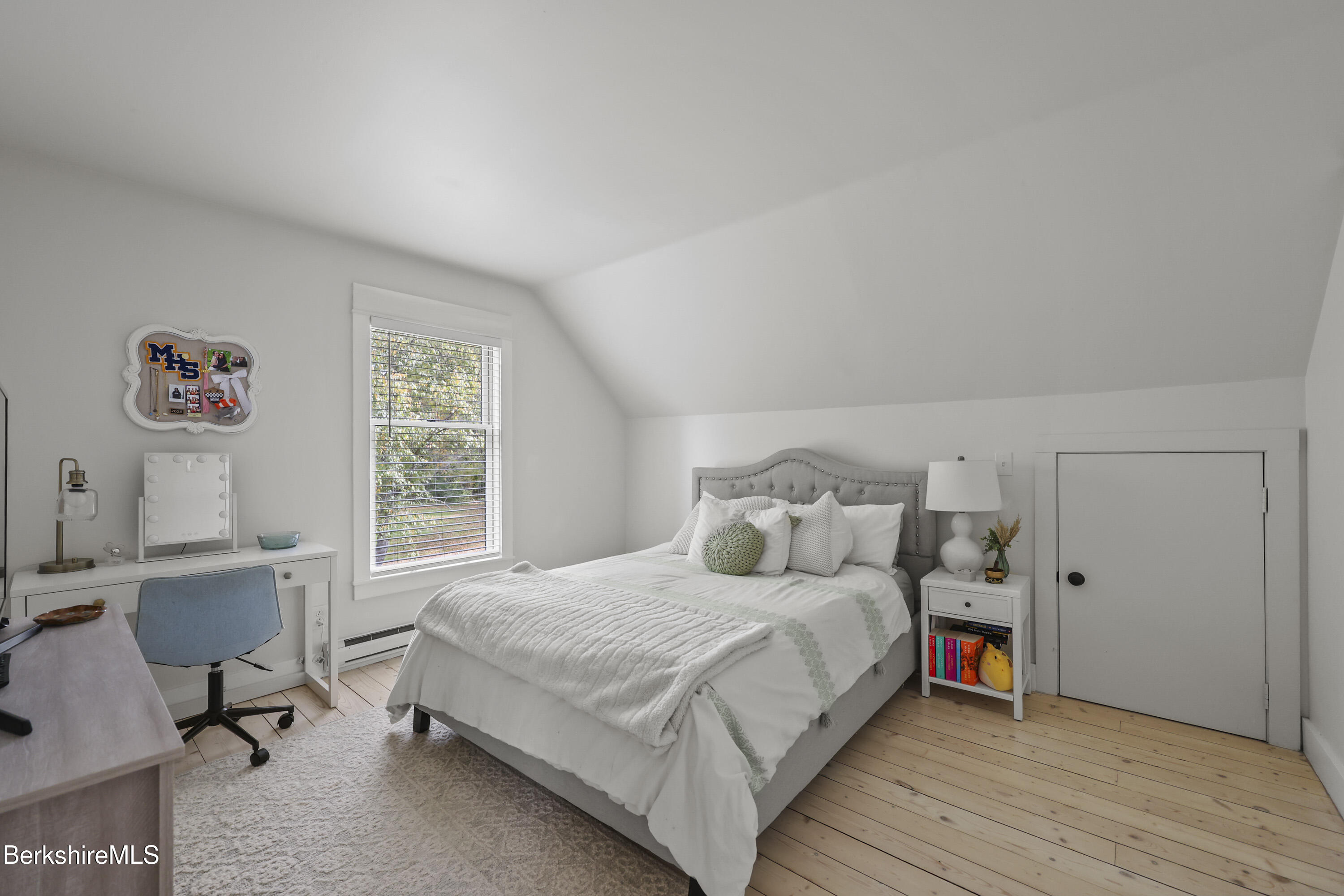 17 Iron Mine Road West Stockbridge, MA 01266 - Photo 35 of 49 a bedroom with a bed a table and a window