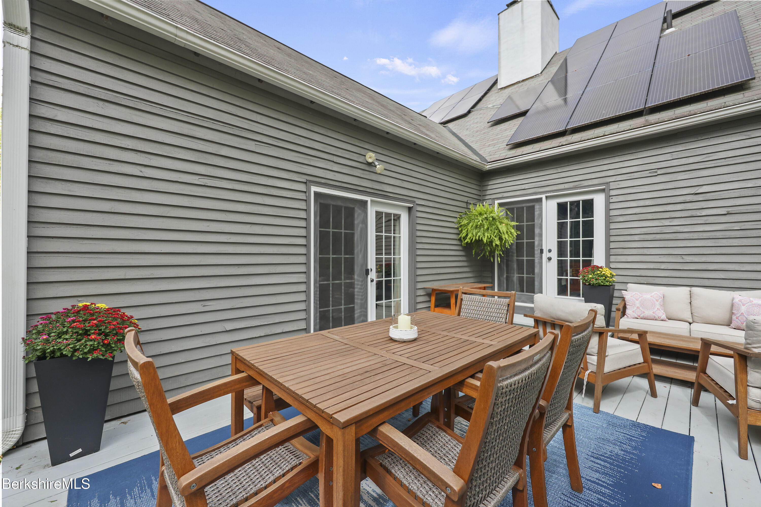 17 Iron Mine Road West Stockbridge, MA 01266 - Photo 40 of 49 a view of a patio with table and chairs and potted plants