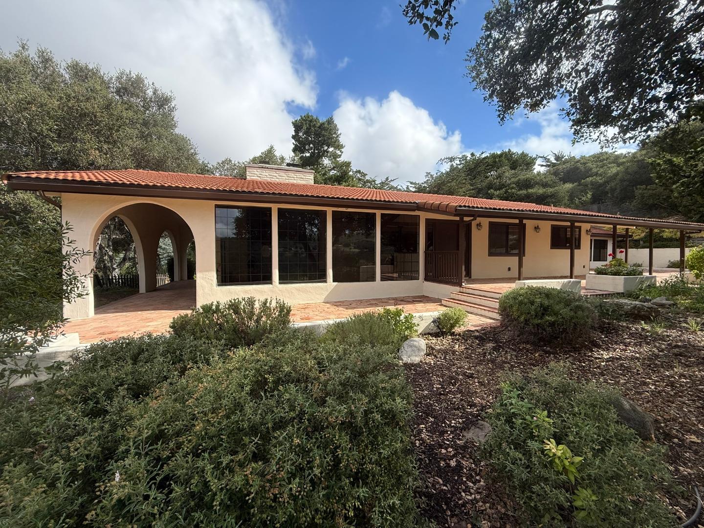 11585 McCarthy Road Carmel Valley, CA 93924 - Photo 8 of 52 front view of house with a garden