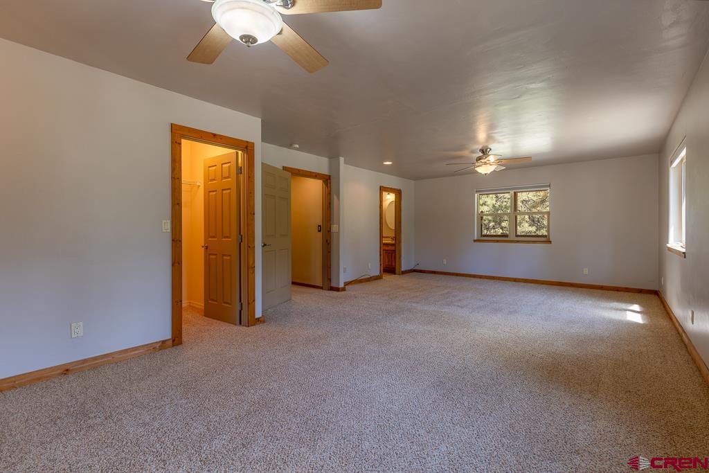 30 Stage Coach Road Bayfield, CO 81122 - Photo 12 of 36 a view of a livingroom with a chandelier