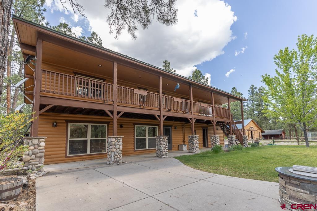 30 Stage Coach Road Bayfield, CO 81122 - Photo 2 of 36 a front view of a house with garden