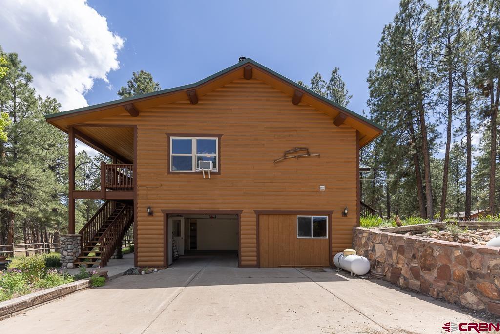 30 Stage Coach Road Bayfield, CO 81122 - Photo 21 of 36 a front view of a house with a garden