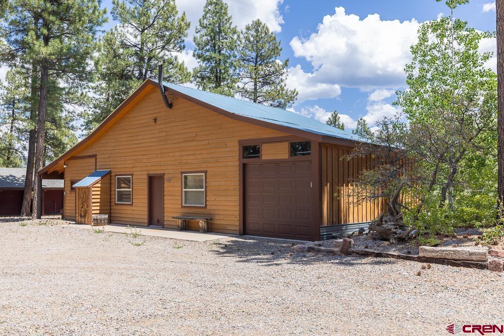 30 Stage Coach Road Bayfield, CO 81122 - Photo 24 of 36 a view of a house with a yard covered in snow