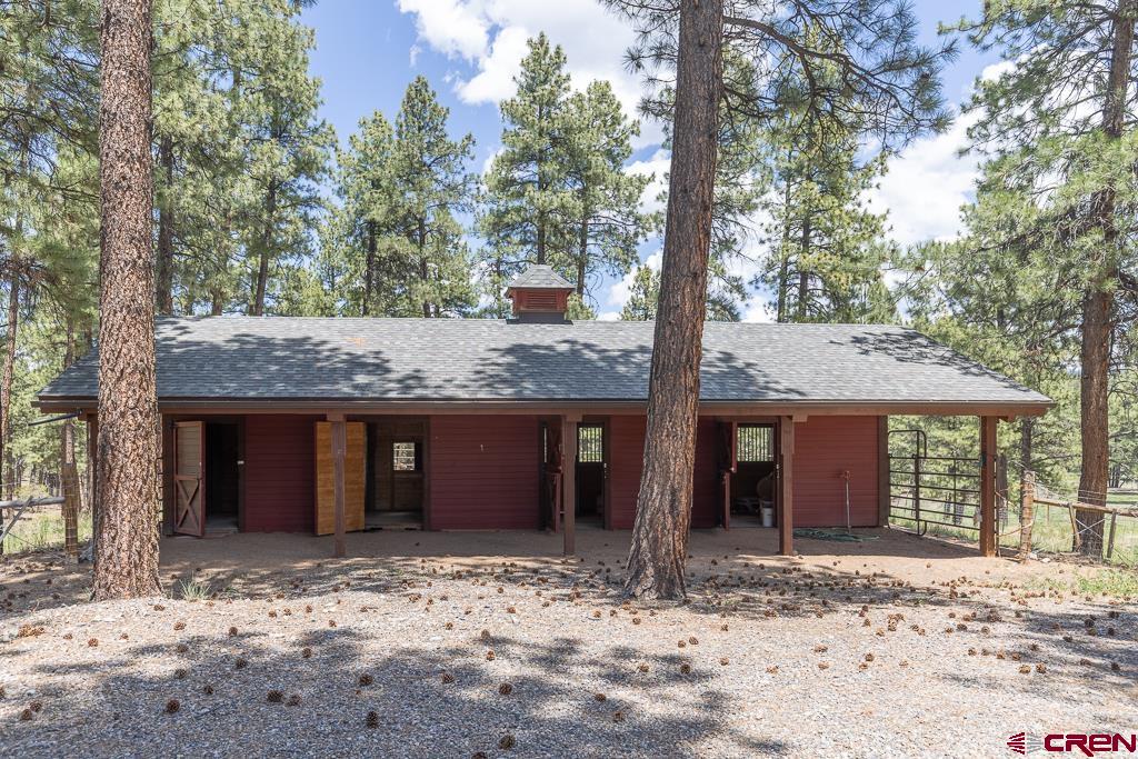 30 Stage Coach Road Bayfield, CO 81122 - Photo 25 of 36 a view of a house with a tree in front of it