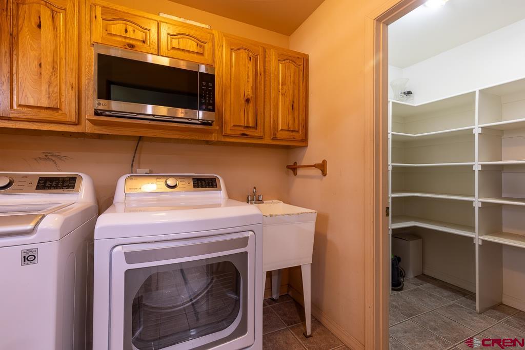 30 Stage Coach Road Bayfield, CO 81122 - Photo 31 of 36 a utility room with dryer and washer