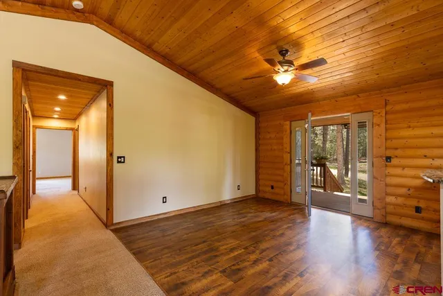 a view of a livingroom with wooden floor