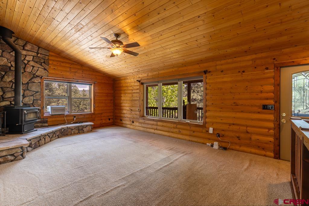30 Stage Coach Road Bayfield, CO 81122 - Photo 8 of 36 en empty room with windows