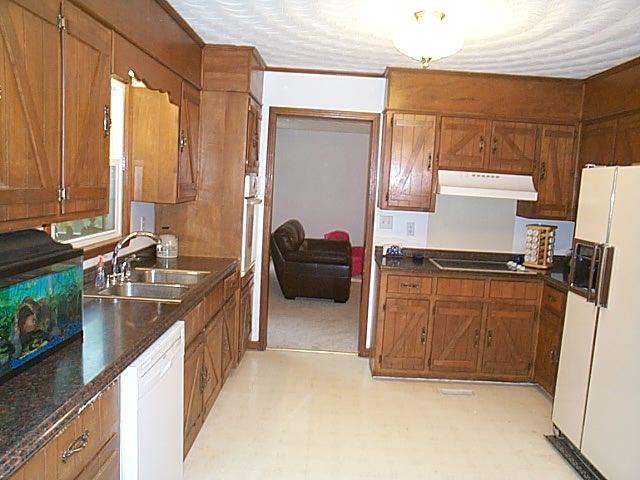 5657 Natchez Trace Road Franklin, TN 37064 - Photo 6 of 18 Kitchen with dishwasher, cooktop stove, built in oven, refrigerator. New countertops in kitchen
