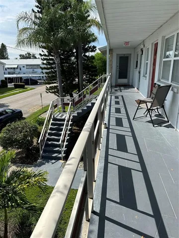 a view of a garden with a tree