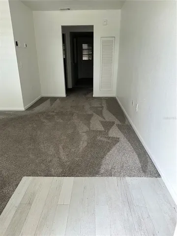 an empty room with closet