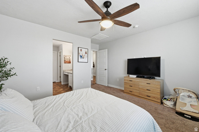 1175 Silver Hollow Road Syracuse, UT 84075 - Photo 17 of 34 Bedroom featuring a ceiling fan with integrated lighting, light gray wall paint, and brown carpet flooring