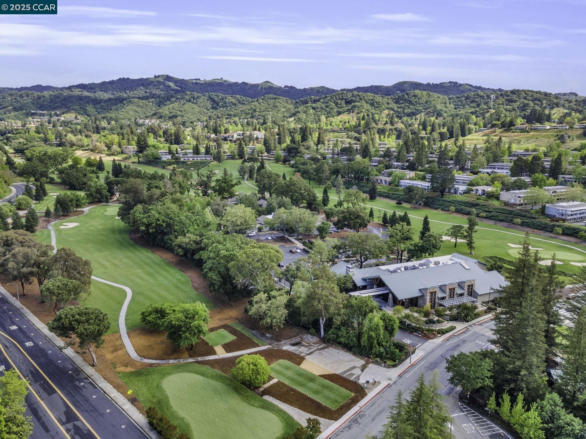 1216 Fairlawn Court, Unit 8 Walnut Creek, CA 94595 - Photo 43 of 49 an aerial view of residential houses with outdoor space and river