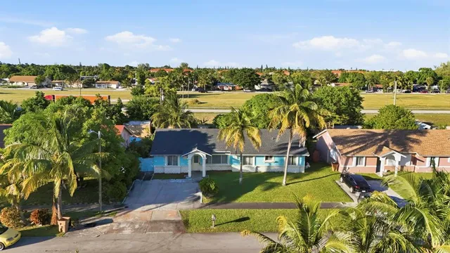 a view of a city with lawn chairs
