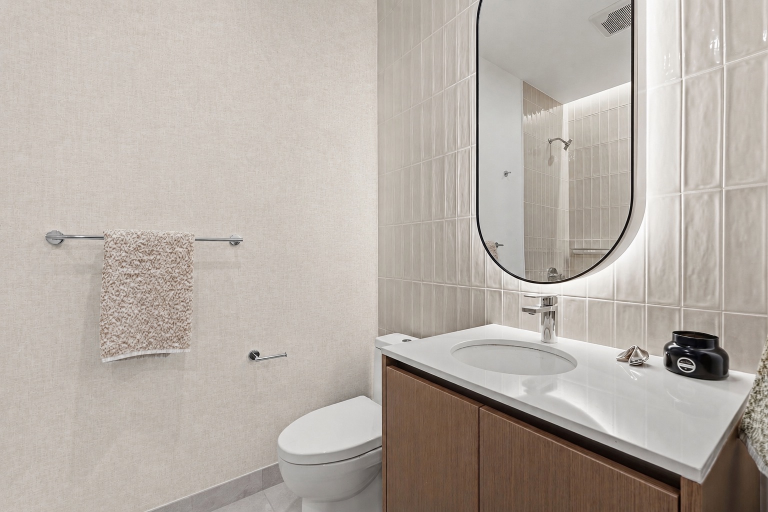 610 Davis Street, Unit 2508 Austin, TX 78701 - Photo 6 of 35 a bathroom with a sink toilet and a mirror