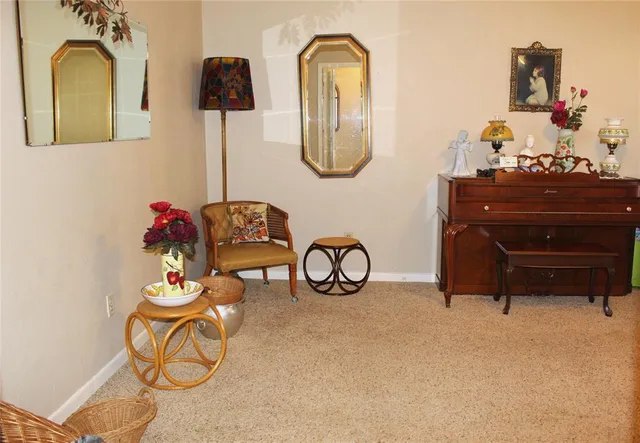 a bathroom with a sink mirror and vanity