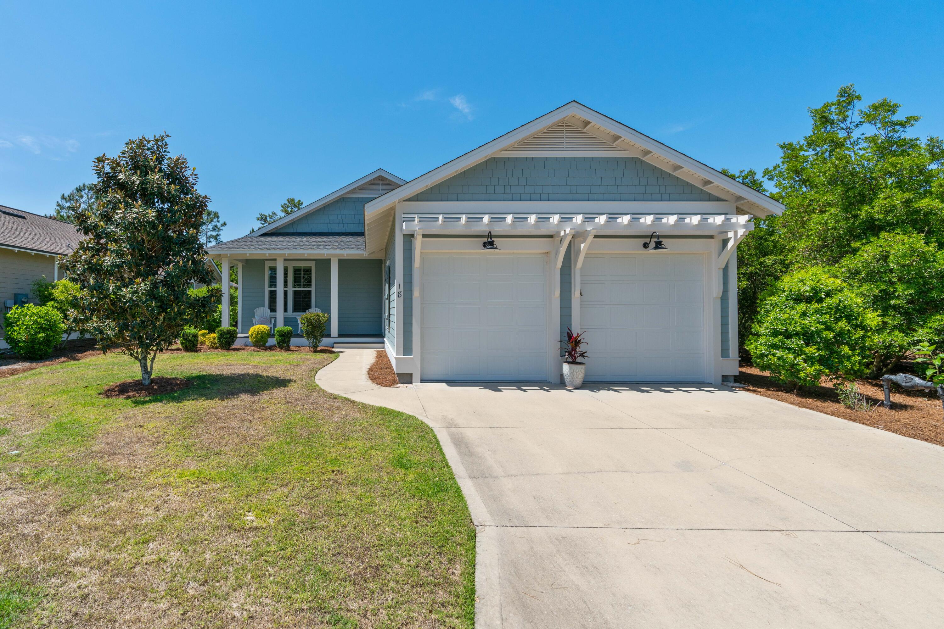 18 Jack Knife Drive Inlet Beach, FL 32461 - Photo 1 of 61 a front view of a house with a yard