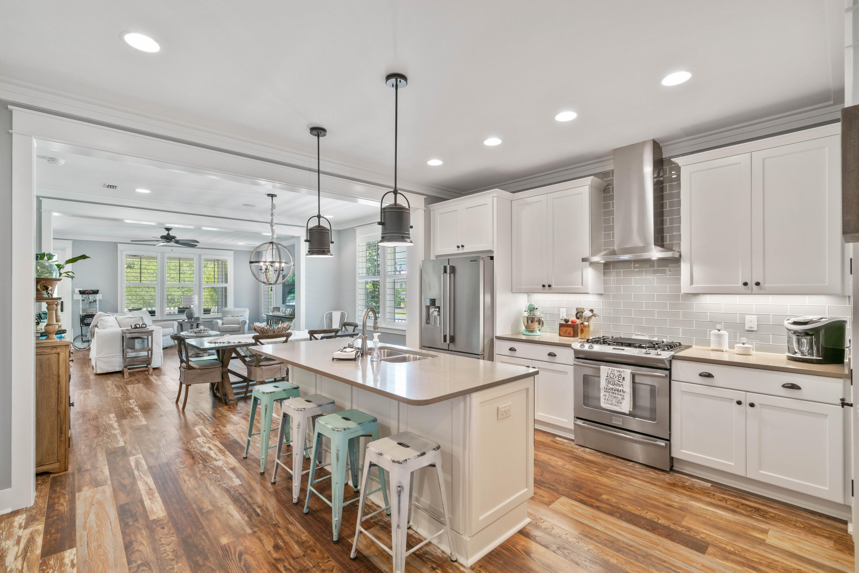 18 Jack Knife Drive Inlet Beach, FL 32461 - Photo 12 of 61 a large kitchen with kitchen island a large island a sink a stove and wooden floor