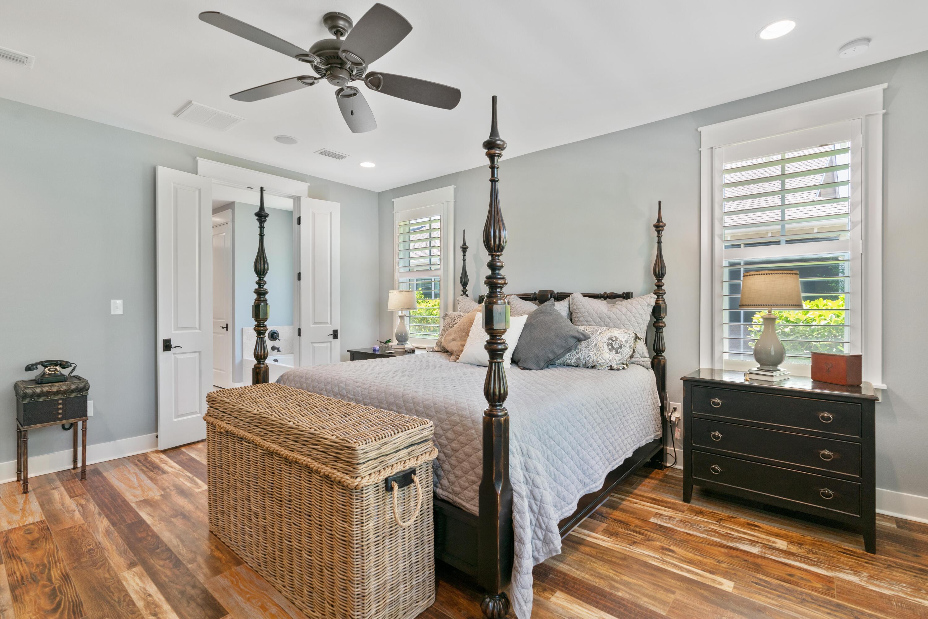 18 Jack Knife Drive Inlet Beach, FL 32461 - Photo 28 of 61 a spacious bedroom with a bed and a chandelier