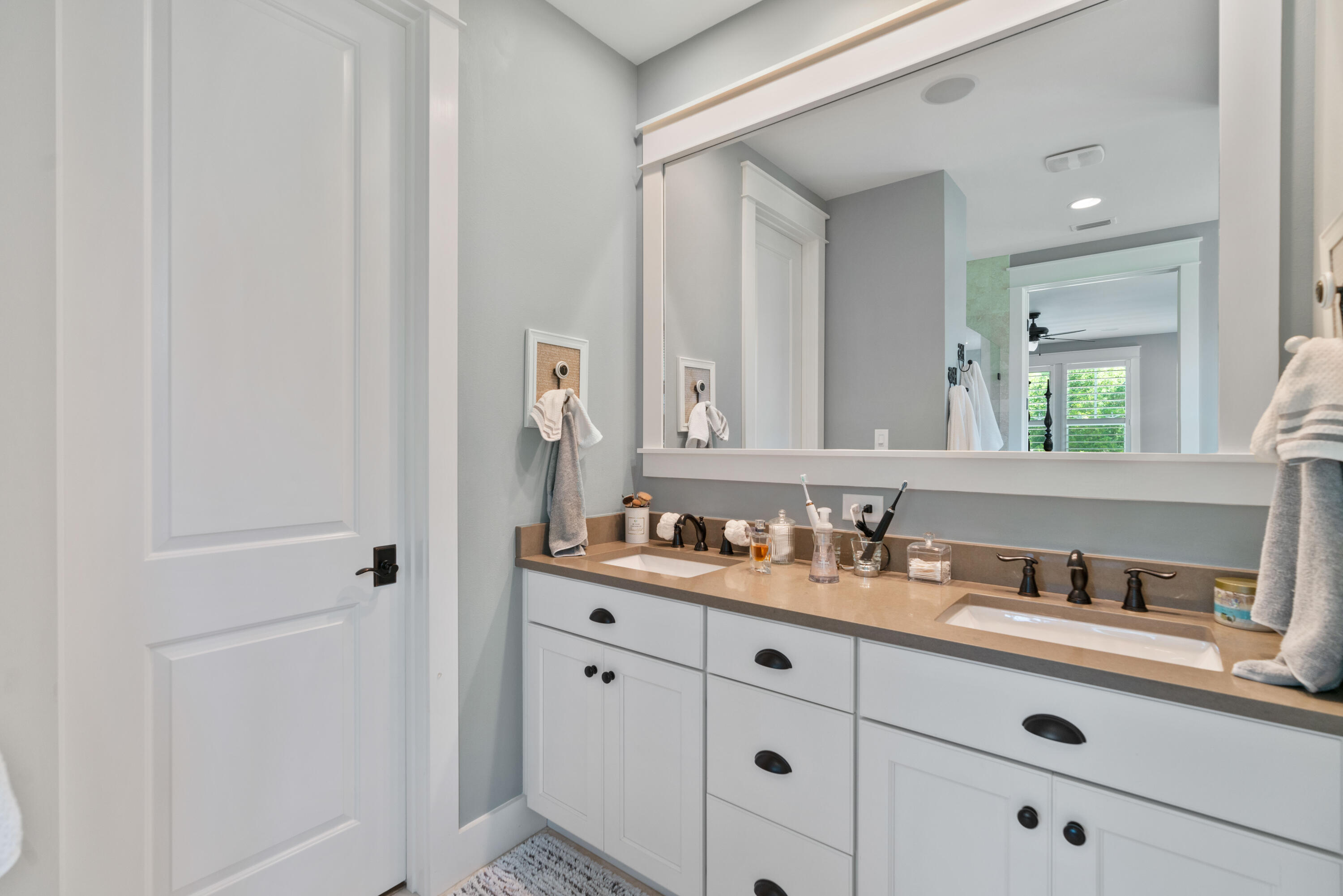 18 Jack Knife Drive Inlet Beach, FL 32461 - Photo 33 of 61 a bathroom with a double vanity sink and mirror