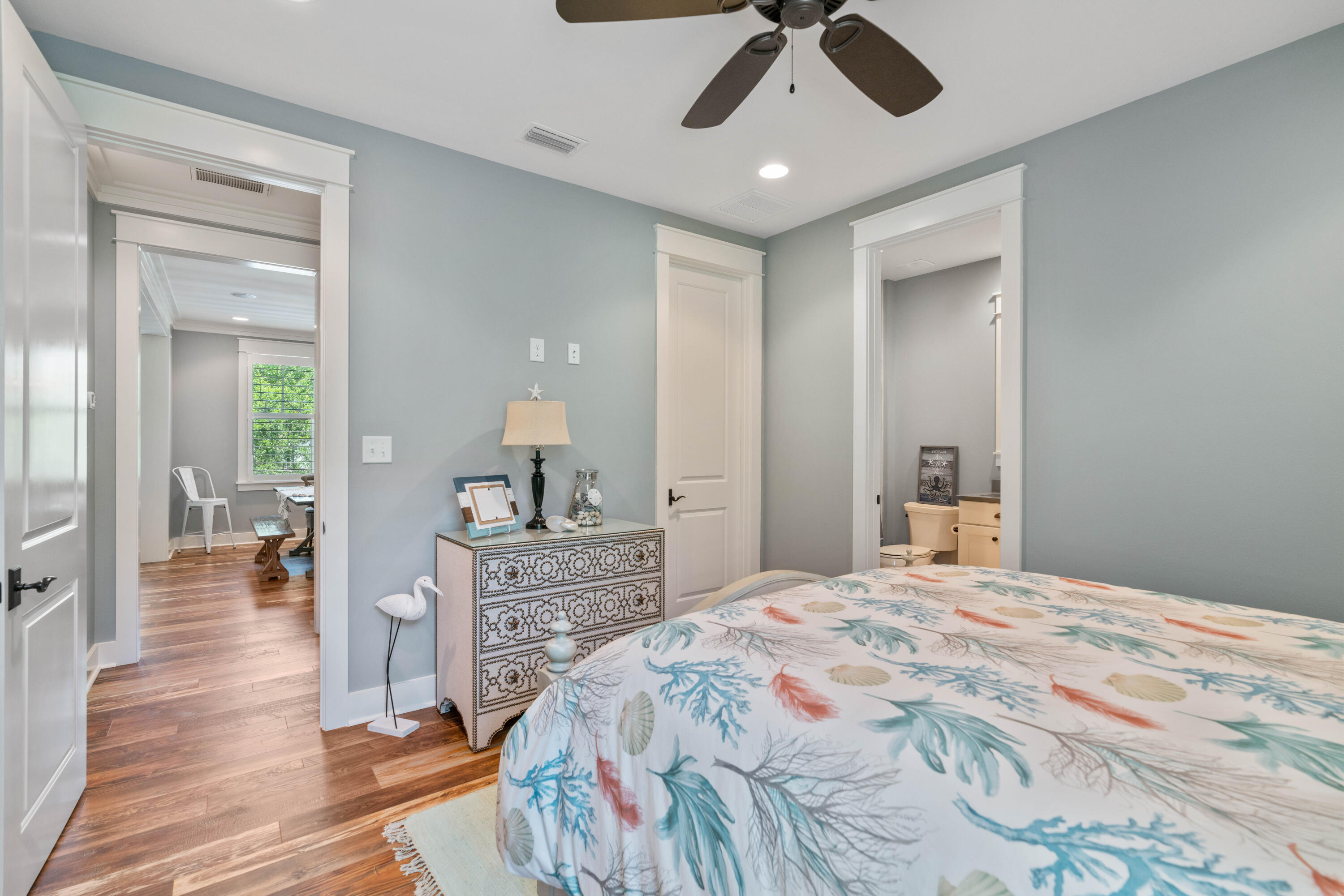 18 Jack Knife Drive Inlet Beach, FL 32461 - Photo 36 of 61 a bedroom with a bed and a chandelier