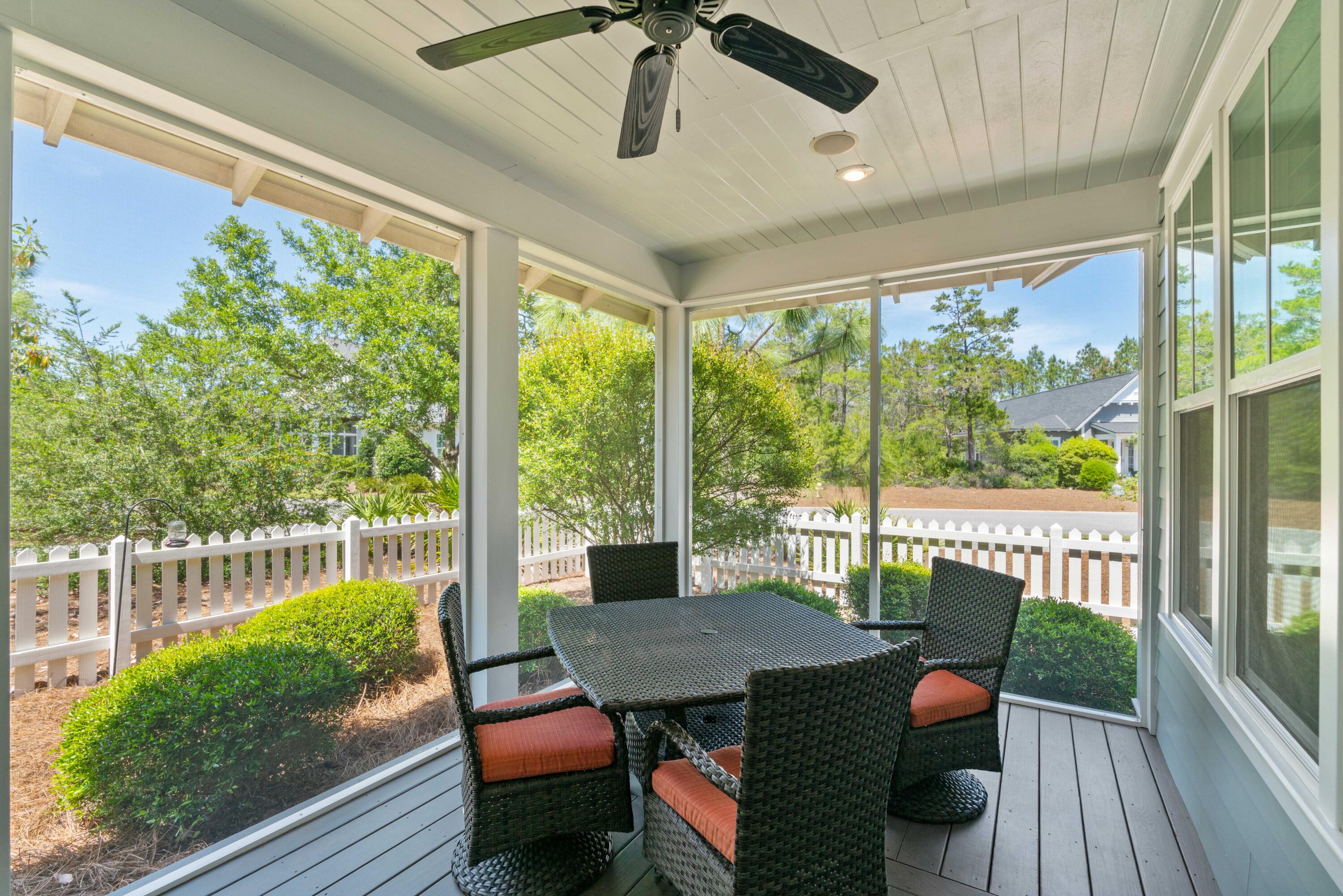 18 Jack Knife Drive Inlet Beach, FL 32461 - Photo 40 of 61 a view of a porch with furniture and wooden floor