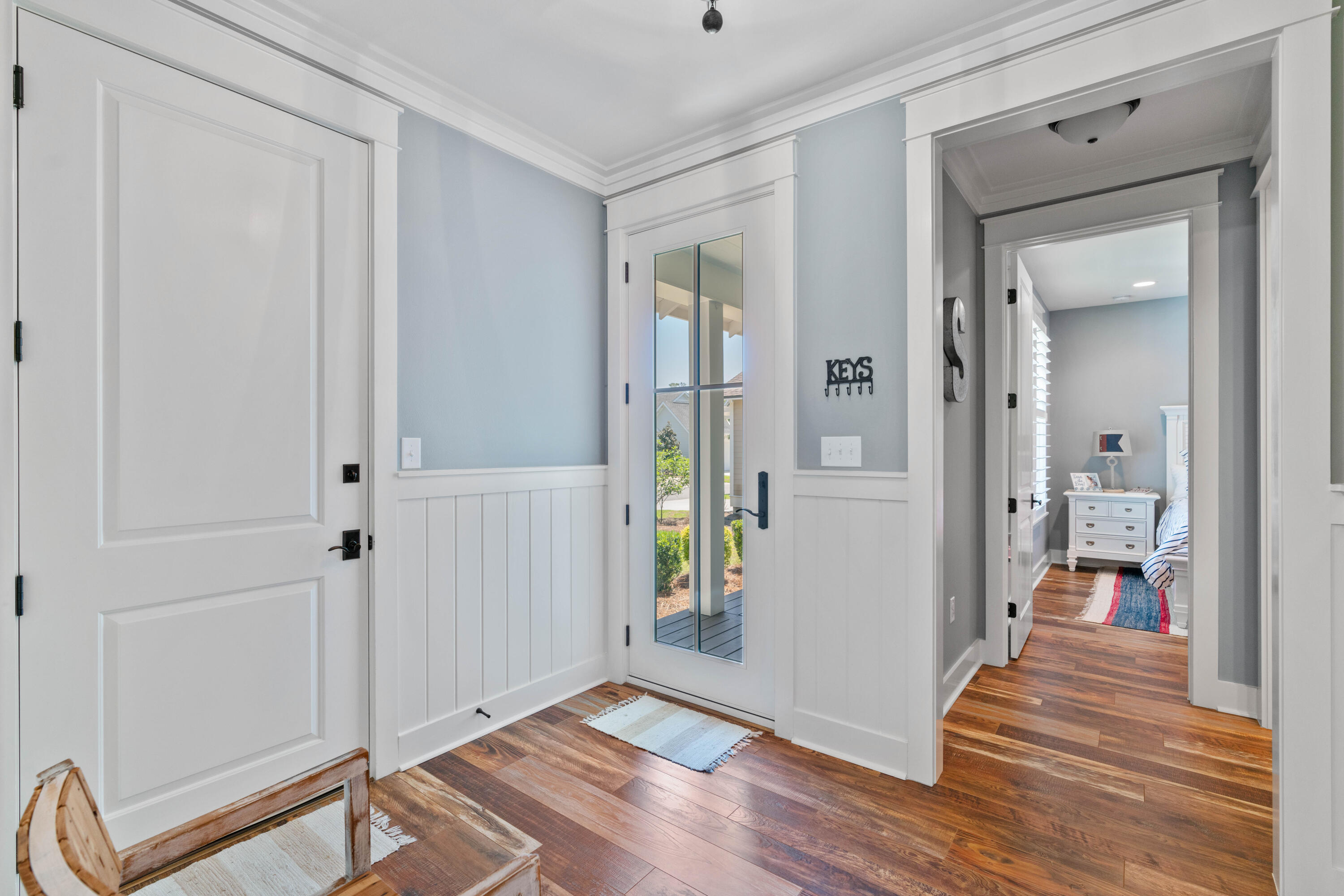 18 Jack Knife Drive Inlet Beach, FL 32461 - Photo 4 of 61 a view of a hallway with wooden floor and staircase