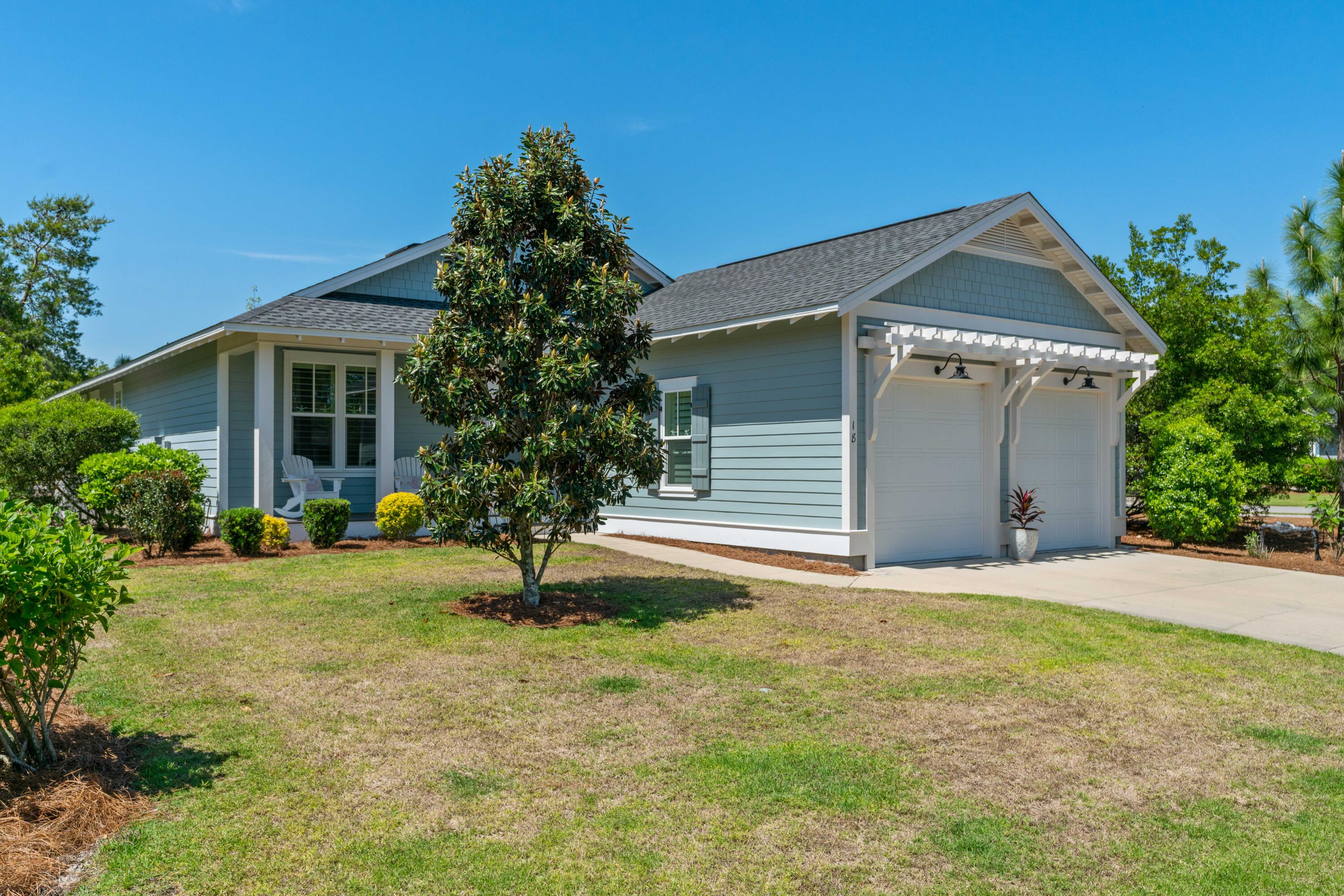 18 Jack Knife Drive Inlet Beach, FL 32461 - Photo 43 of 61 a view of a house with backyard and a tree