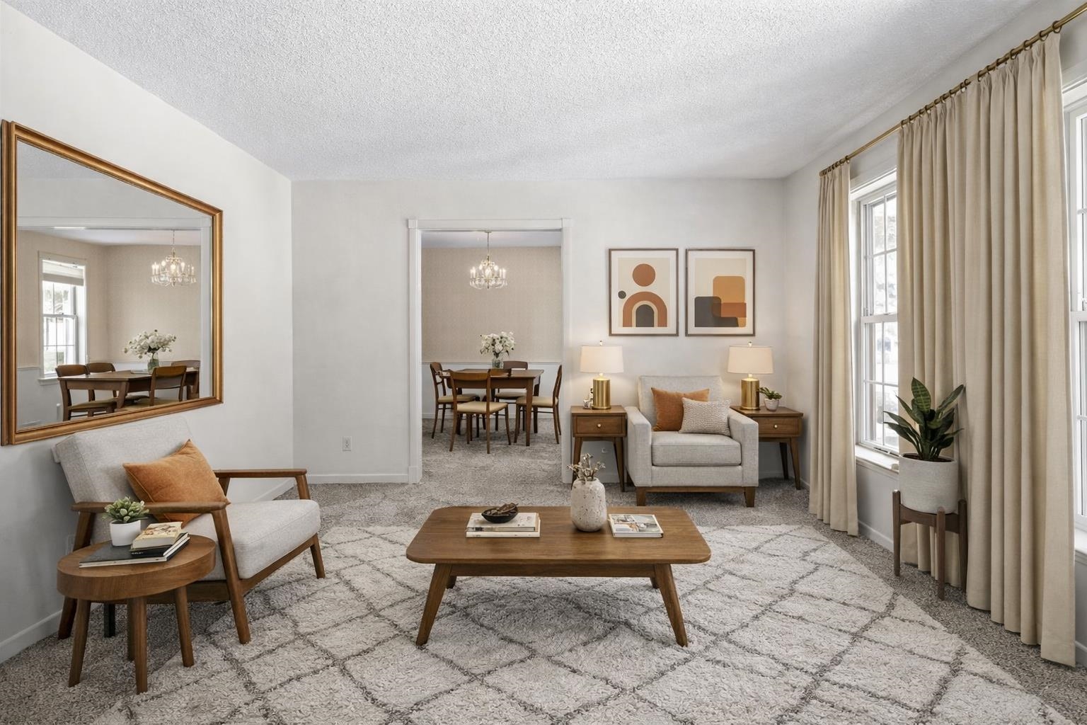 436 Sterling Drive Collierville, TN 38017 - Photo 11 of 40 Carpeted living room with plenty of natural light, a chandelier, and a textured ceiling