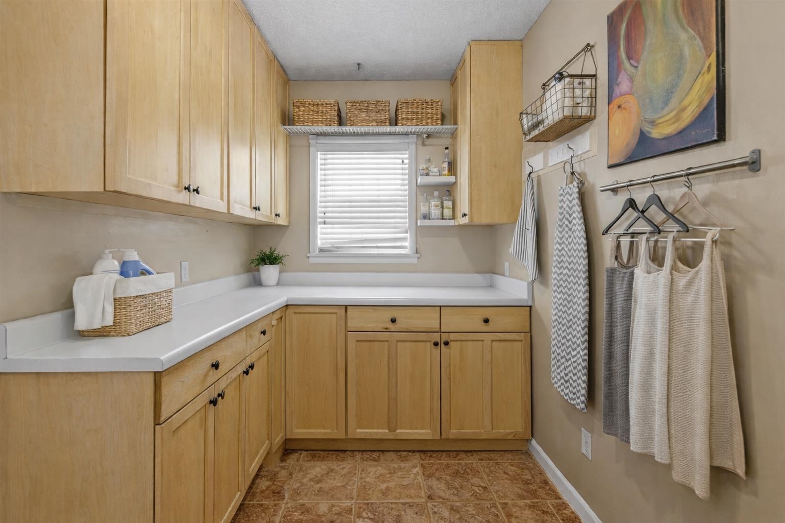 436 Sterling Drive Collierville, TN 38017 - Photo 38 of 40 Kitchen featuring light brown cabinets, light countertops, and open shelves