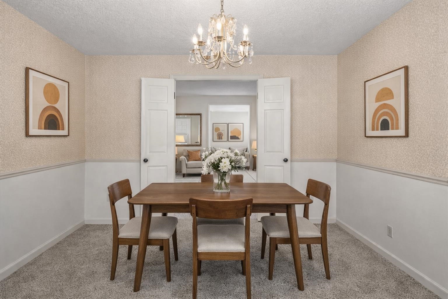 436 Sterling Drive Collierville, TN 38017 - Photo 9 of 40 Dining space with a chandelier, a textured ceiling, light carpet, and wainscoting