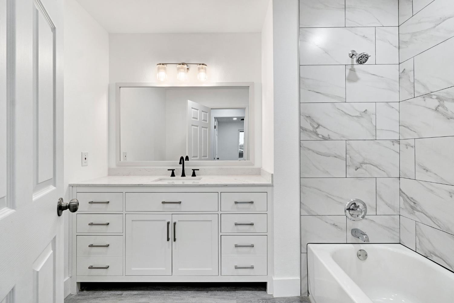 2808 Riverview Drive Madera, CA 93637 - Photo 21 of 35 full bath with vanity and shower / bath combination