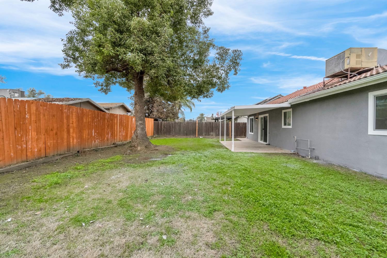 2808 Riverview Drive Madera, CA 93637 - Photo 34 of 35 fenced backyard featuring a patio area