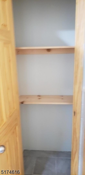 67 Main Street, Unit 2 Stanhope, NJ 07874 - Photo 14 of 19 a close up of a shower