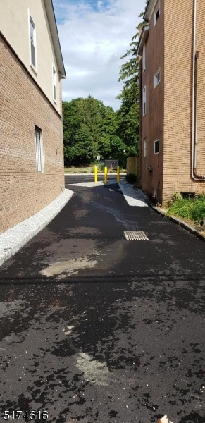 67 Main Street, Unit 2 Stanhope, NJ 07874 - Photo 16 of 19 a view of a back yard of the house