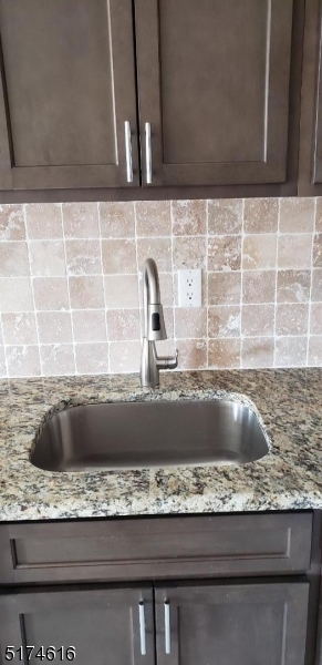 67 Main Street, Unit 2 Stanhope, NJ 07874 - Photo 4 of 19 a view of sink and granite counter top