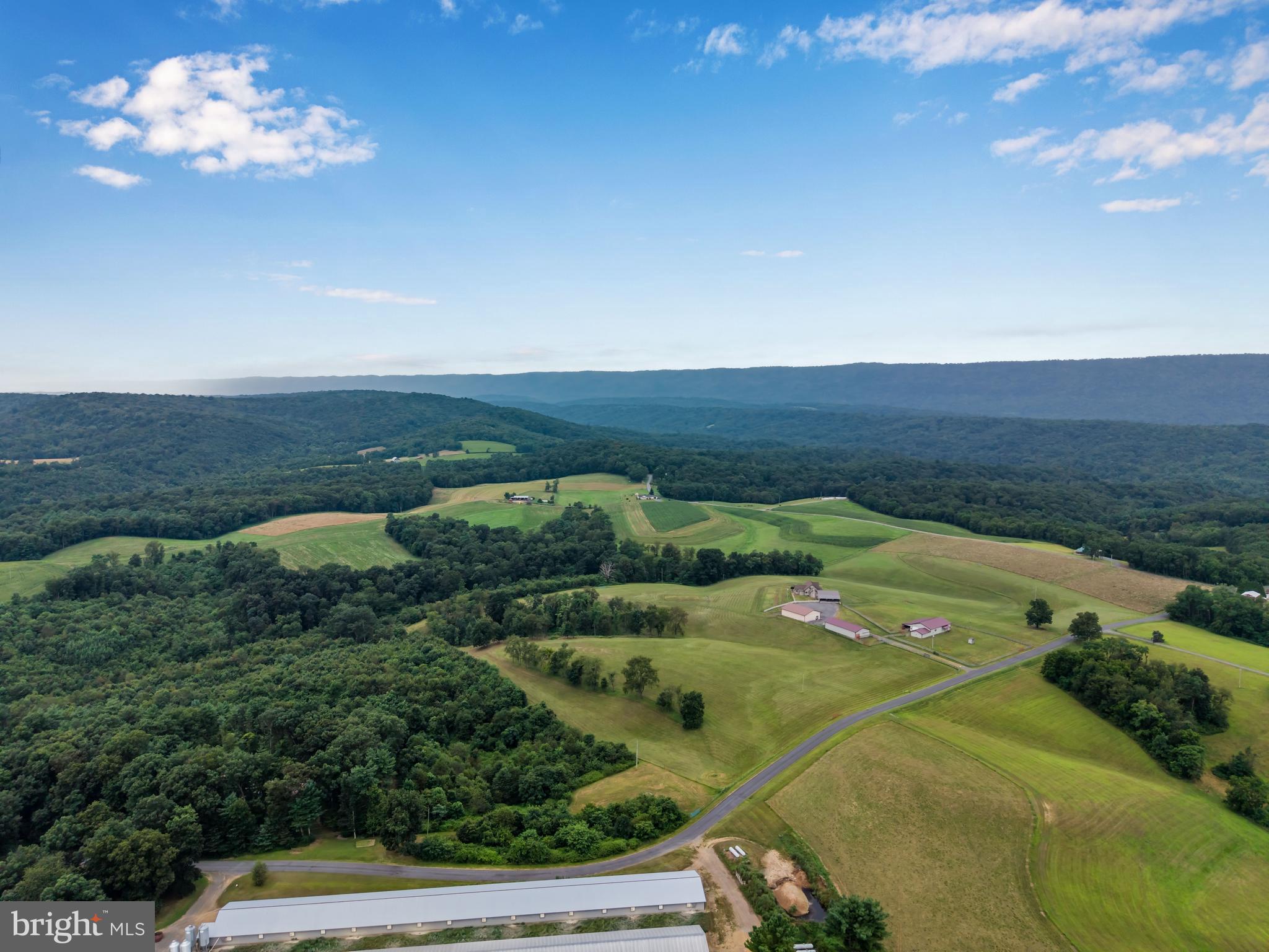 729 Gloss Road East Waterford, PA 17021 - Photo 13 of 70 an aerial view of a house having yard