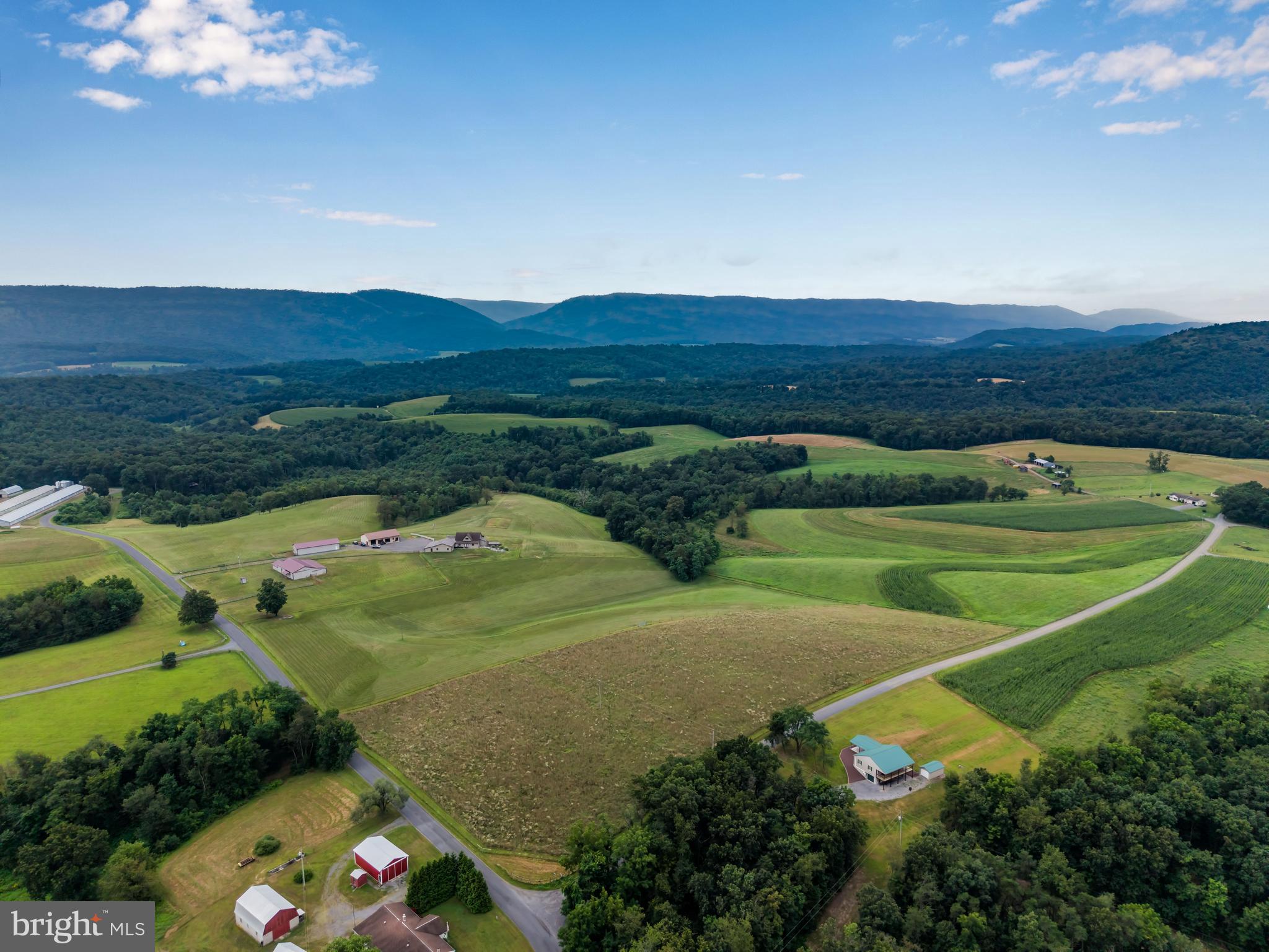 729 Gloss Road East Waterford, PA 17021 - Photo 16 of 70 a view of a golf course with a houses