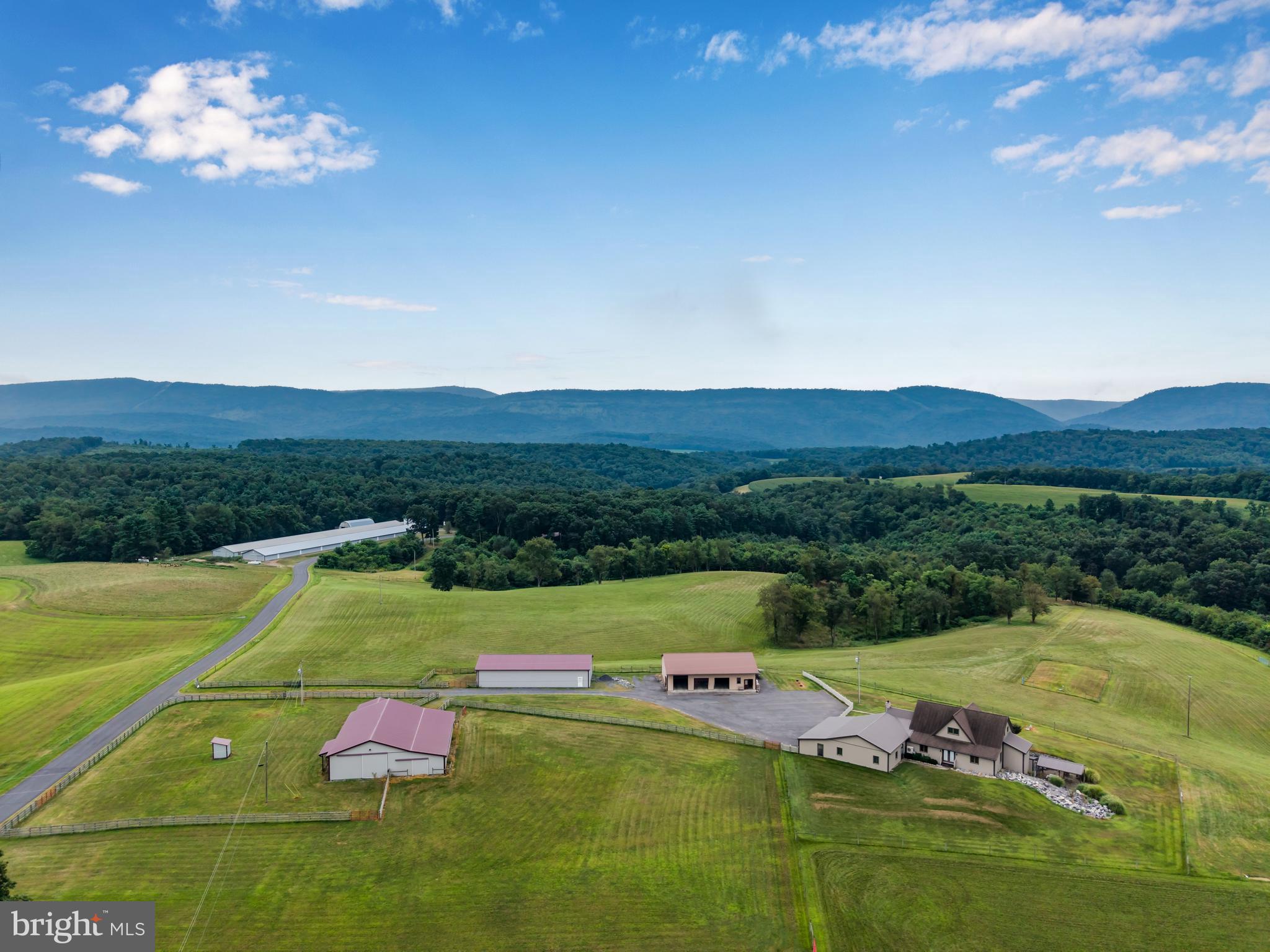 729 Gloss Road East Waterford, PA 17021 - Photo 18 of 70 a view of a big yard with an outdoor seating
