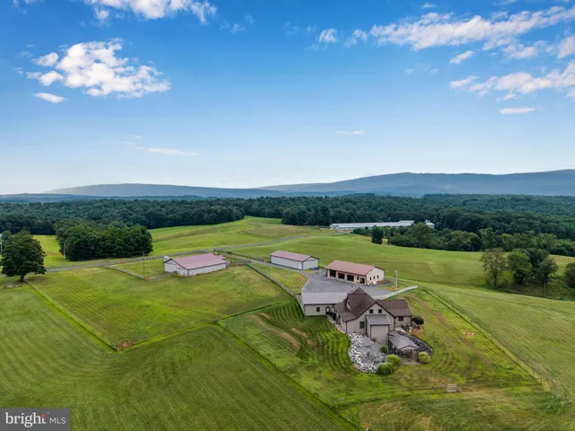 a view of a house with a big yard